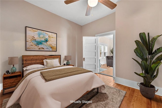 bedroom featuring ceiling fan and light wood-type flooring