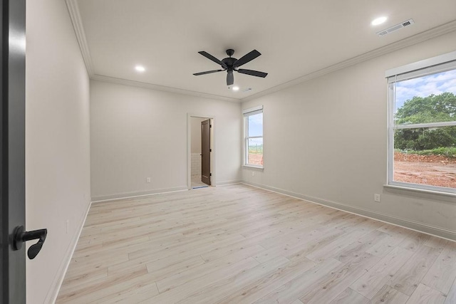 7967 Range Ave, Springdale, AR 72762 - unfurnished room featuring healthy amount of natural light, ornamental molding, baseboards, light wood finished floors, and recessed lighting