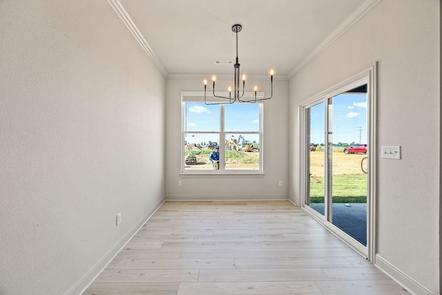 7967 Range Ave, Springdale, AR 72762 - unfurnished dining area featuring ornamental molding, a chandelier, light wood-style floors, and baseboards