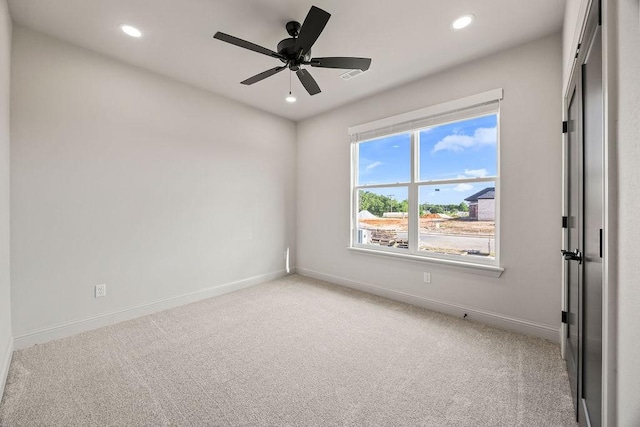 7967 Range Ave, Springdale, AR 72762 - unfurnished room with light colored carpet, recessed lighting, baseboards, and ceiling fan