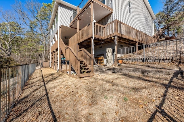 back of property featuring a deck