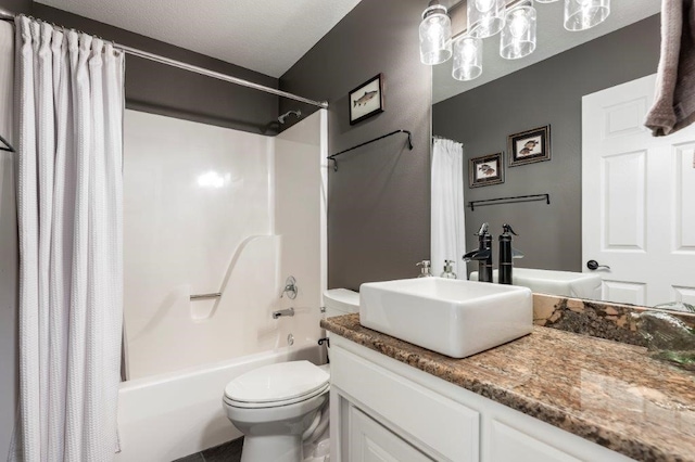 full bathroom with shower / bath combo, vanity, and toilet