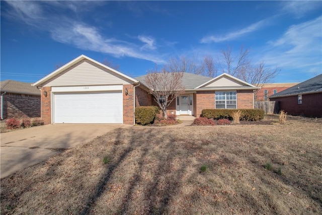 ranch-style home featuring a garage and a front lawn