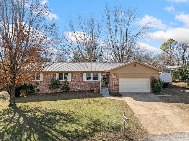 ranch-style home with a garage and a front yard