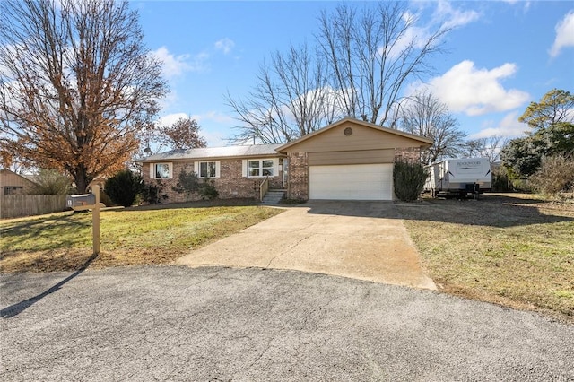 view of front of home featuring a garage and a front lawn