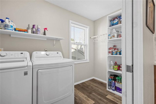 laundry area featuring dark hardwood / wood-style floors and independent washer and dryer