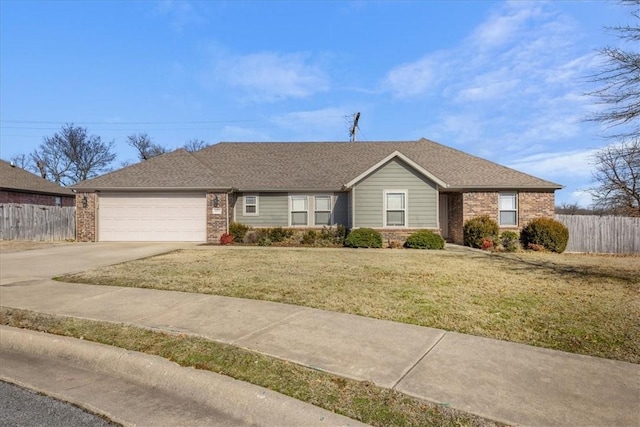 ranch-style home with a garage and a front lawn