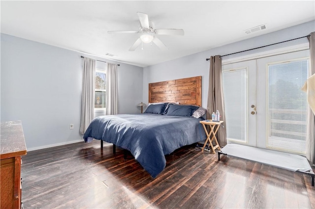 bedroom with dark hardwood / wood-style floors, access to exterior, and ceiling fan