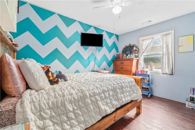 bedroom featuring hardwood / wood-style flooring