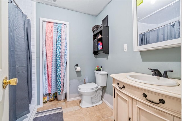 bathroom featuring vanity, curtained shower, tile patterned floors, and toilet