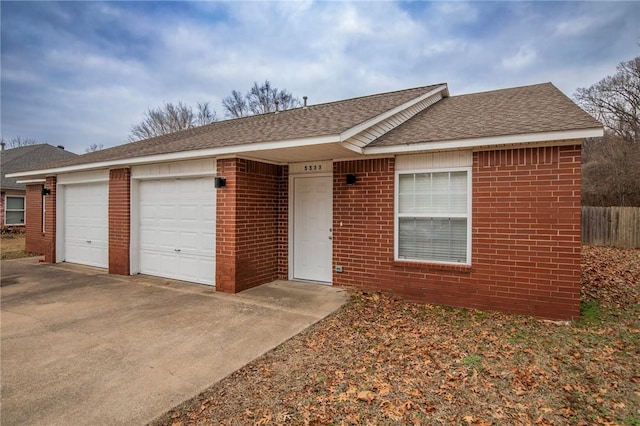 single story home with a garage