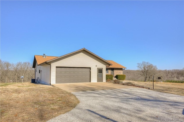 single story home featuring a garage