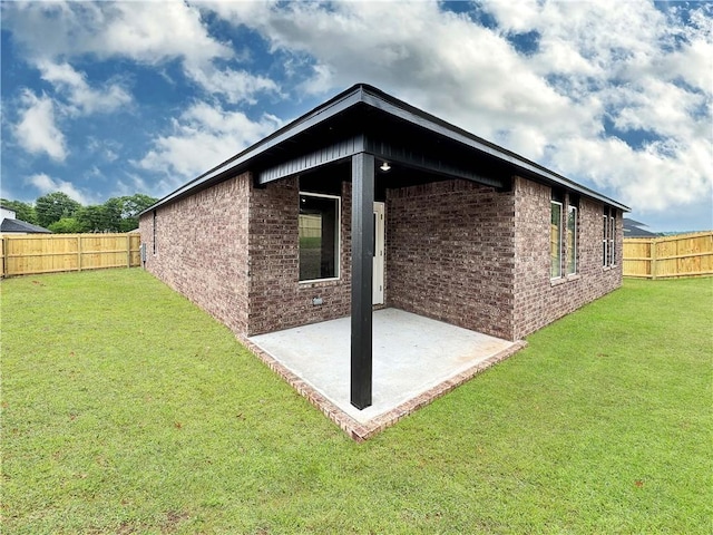 1623 Ridgeview Dr, Springdale, AR 72762 - back of property with a patio area and brick siding
