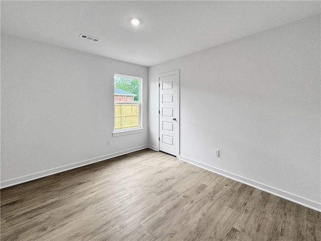 1623 Ridgeview Dr, Springdale, AR 72762 - spare room featuring wood finished floors and baseboards