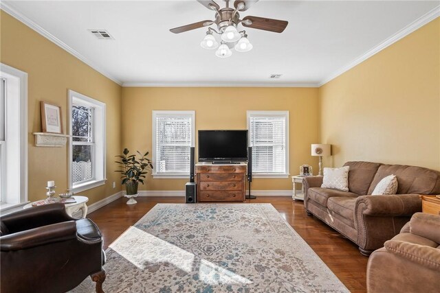 living room featuring crown molding, ceiling fan, and dark hardwood / wood-style flooring