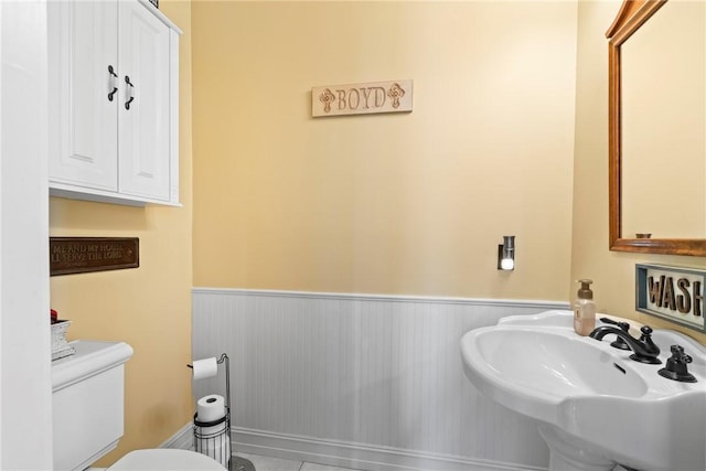 bathroom with sink and toilet