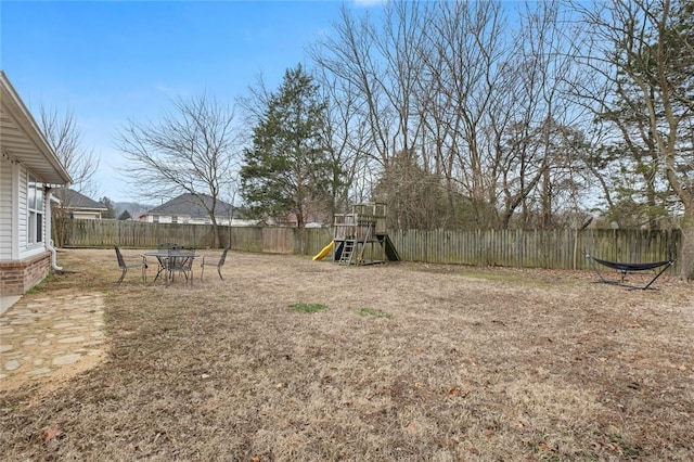 view of yard featuring a playground