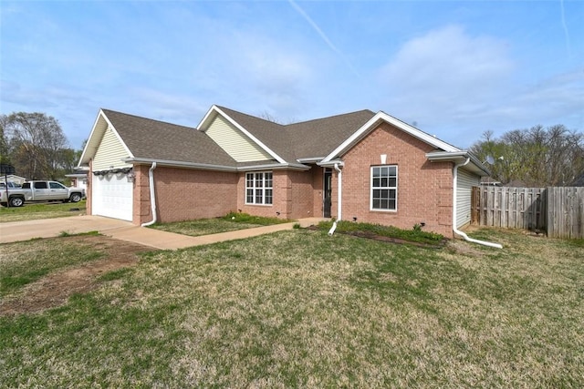 ranch-style house featuring driveway, an attached garage, fence, brick siding, and a front lawn