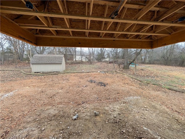 view of patio / terrace with a shed