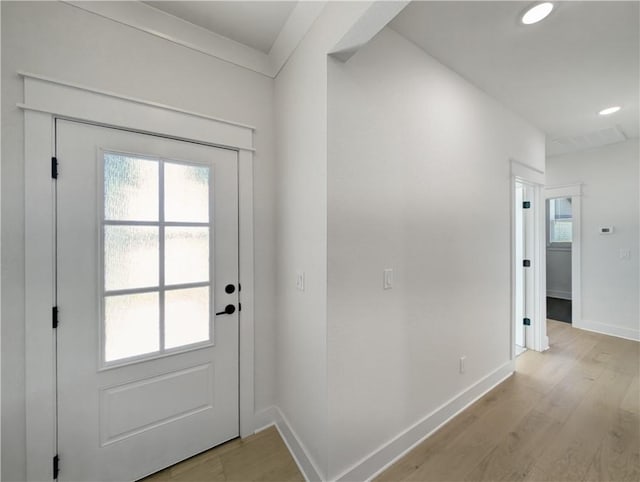 entryway featuring light hardwood / wood-style flooring and a wealth of natural light