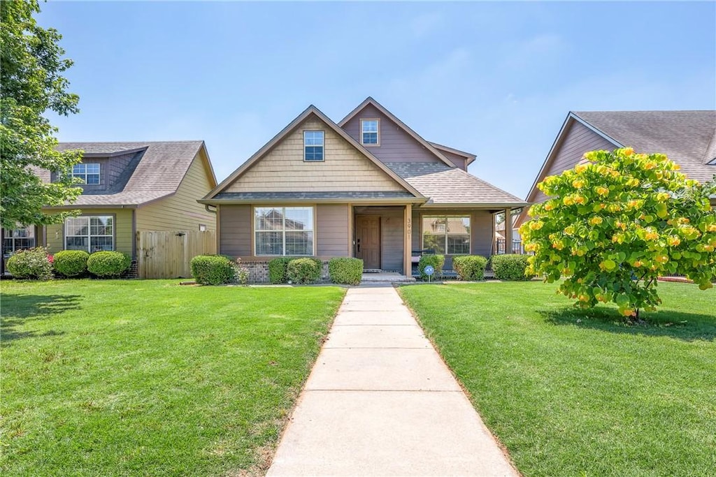 view of front of house with a front lawn