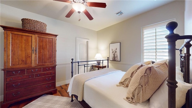 bedroom featuring ceiling fan and wood-type flooring