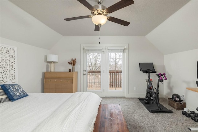 carpeted bedroom with ceiling fan, lofted ceiling, access to exterior, and a textured ceiling