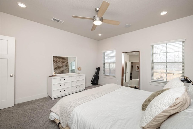 bedroom featuring light carpet and ceiling fan