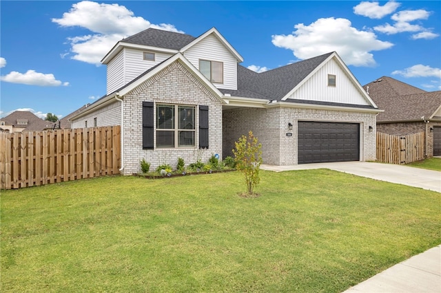 view of front of home featuring a garage and a front yard