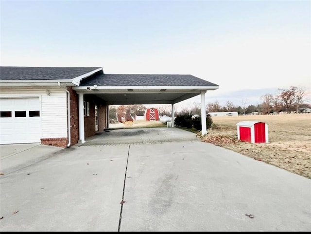 exterior space featuring a garage and a carport