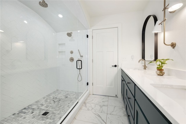 bathroom with vanity and walk in shower