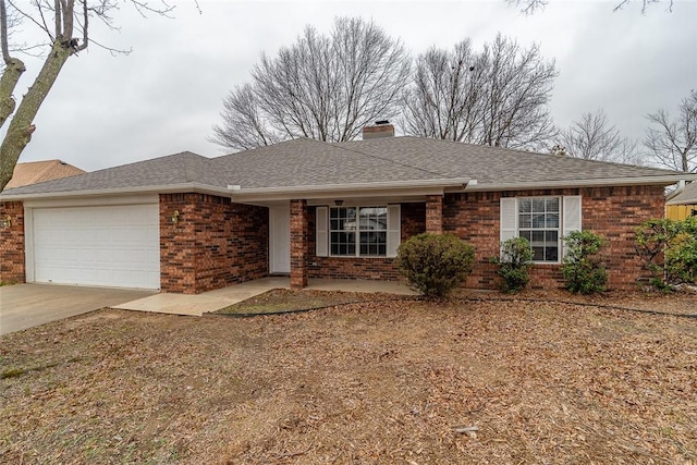 ranch-style home with a garage