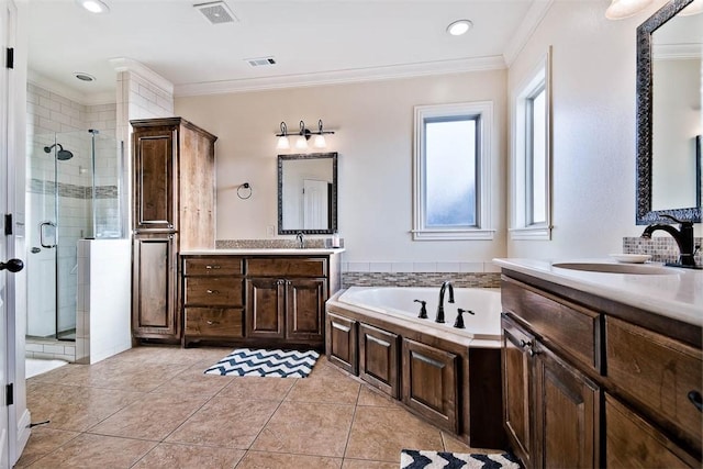 bathroom featuring ornamental molding, independent shower and bath, tile patterned flooring, and vanity