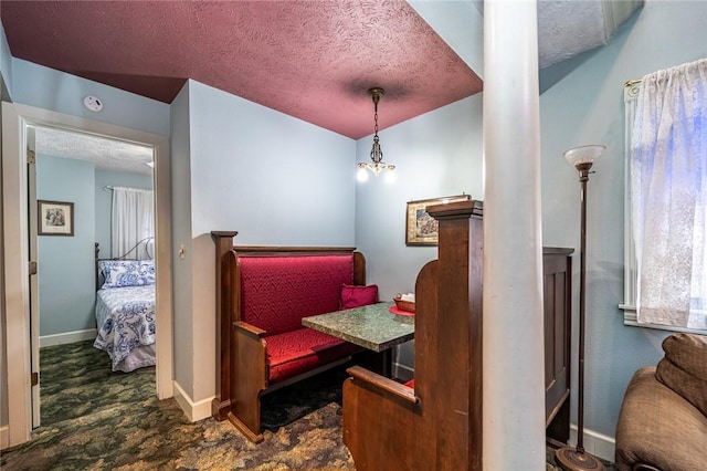 sitting room with a textured ceiling