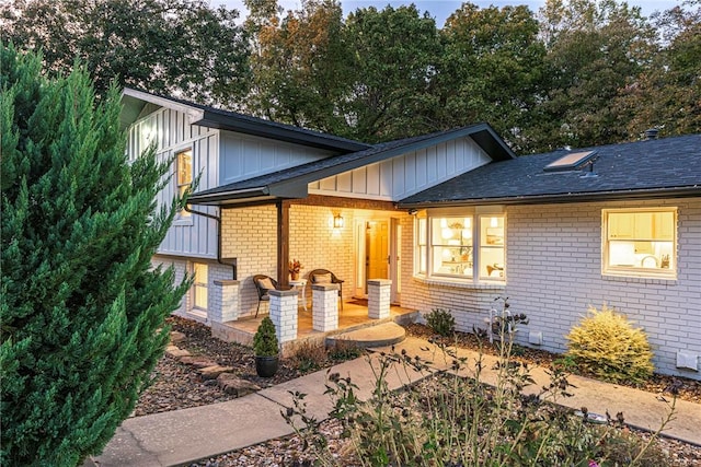 back of house with a patio area