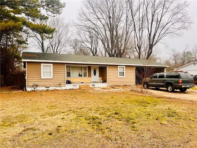 ranch-style house with a front lawn