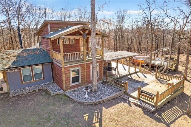17575 Pear Blossom Dr, Gentry, AR 72734 - back of property featuring roof with shingles and a deck