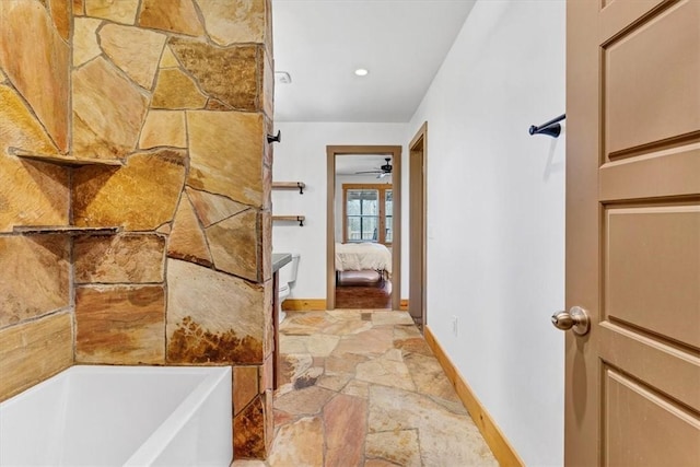 bathroom with a washtub