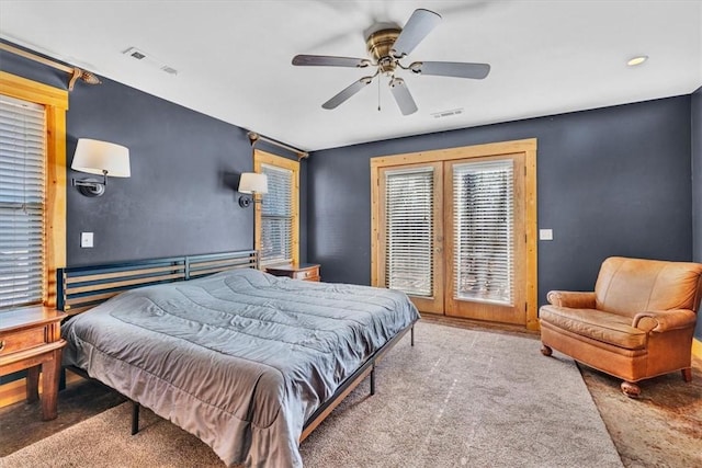 bedroom with french doors, ceiling fan, access to exterior, and carpet