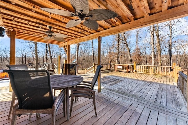 wooden deck with ceiling fan