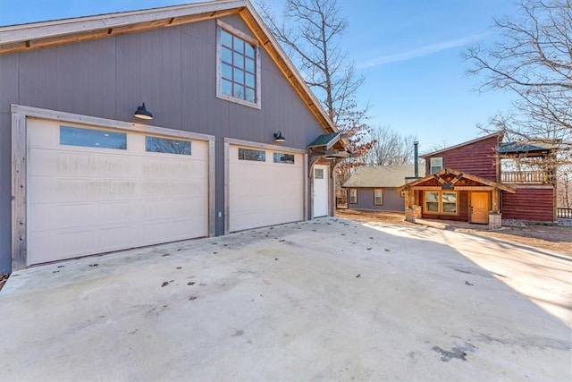 17575 Pear Blossom Dr, Gentry, AR 72734 - garage featuring concrete driveway and a detached garage