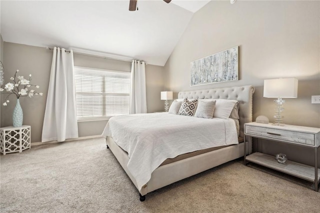 carpeted bedroom featuring lofted ceiling and ceiling fan