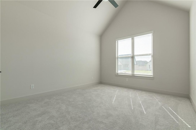 1200 Carrara St, Tontitown, AR 72762 - spare room featuring ceiling fan, light carpet, vaulted ceiling, and baseboards
