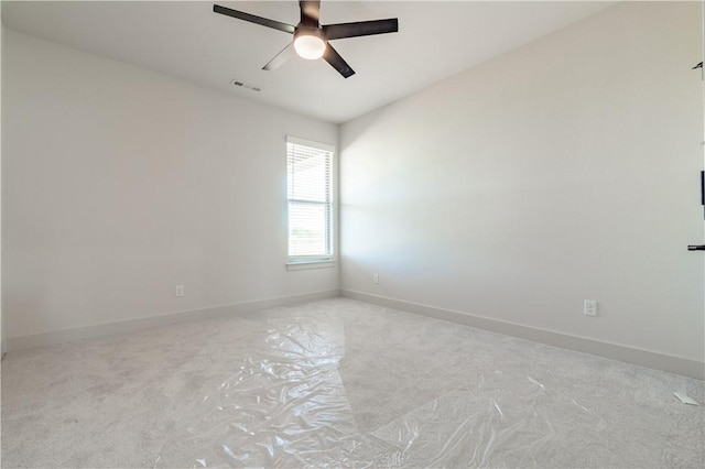 1200 Carrara St, Tontitown, AR 72762 - empty room with ceiling fan, carpet flooring, and baseboards