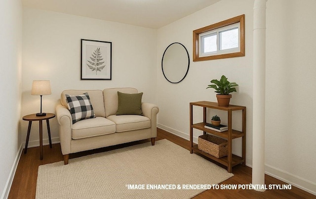 living room with baseboards and wood finished floors