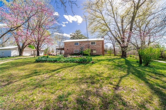 10624 W High Meadows Dr, Rogers, AR 72756 - view of green lawn featuring a garage