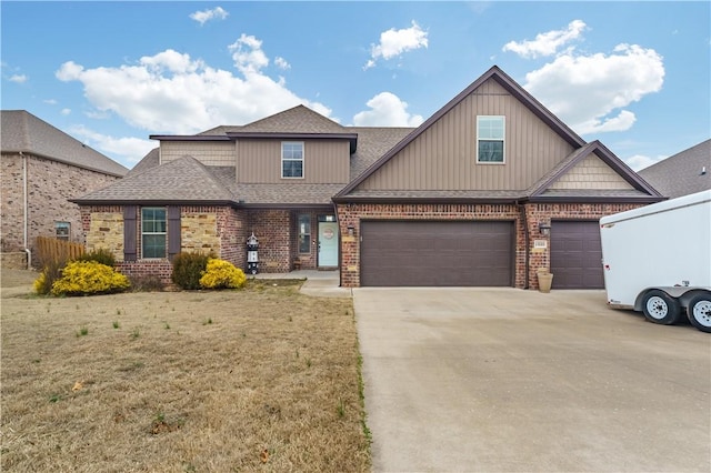 view of front facade featuring a garage and a front yard