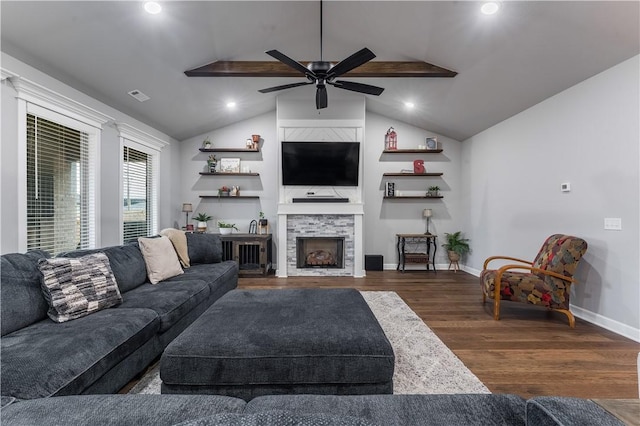 living room featuring dark wood-type flooring, ceiling fan, and vaulted ceiling with beams