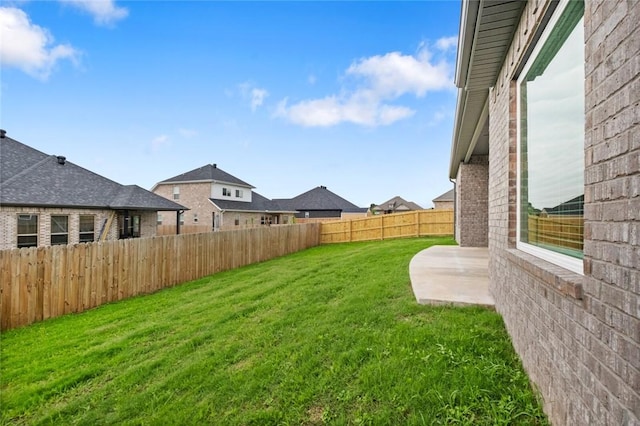 1808 Charles St, Pea Ridge, AR 72751 - fenced backyard with a patio area