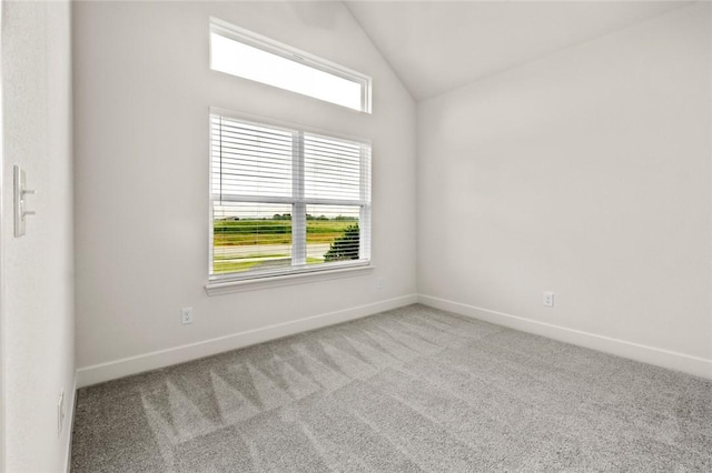 1808 Charles St, Pea Ridge, AR 72751 - spare room featuring vaulted ceiling and carpet floors